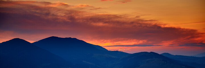 sunset, beautiful cloudy sky in carpathian mountains, summer landscape, spruces on hills
