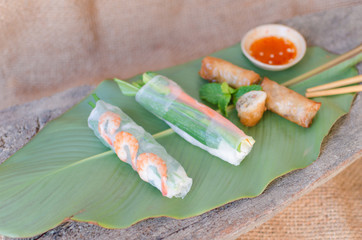Three typical kinds of Vietnamese rolls: Fried Spring Rolls, Summer Rice Paper Rolls, and Vegetarian Rolls