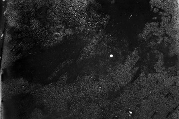 Wet glass texture. Wet cold glass on black background. Drops close up.