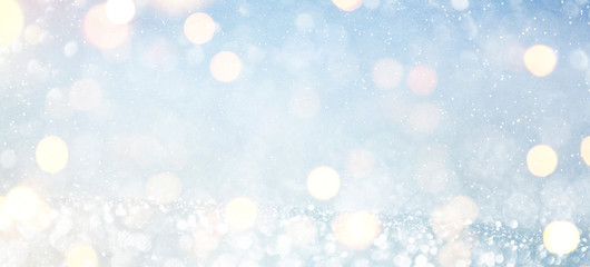 Blurred background with bokeh. Christmas and Happy New Year greeting card.