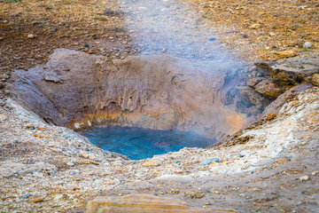 Geysir Golden Circle in Iceland little Geysir deep blue and boiling hot, brother of Strokkur