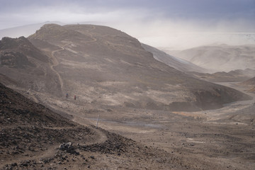 Volcanic landscape during ash storm on the Fimmvorduhals hiking trail. Iceland