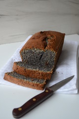 Food photo still life poppy seed cake and knife