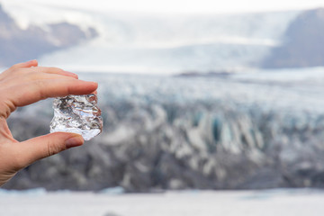 Vatnajoekull glacier in Iceland ice of the glacier between fingers in front of the deep blue ice...