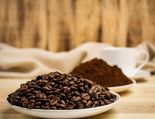 Fototapeta na wymiar Stage coffee bean, powder, cup of coffee