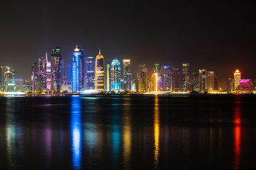 Vibrant Skyline of Doha at Night as seen from the opposite side of the capital city bay at night