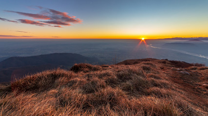 Winter sunset from an alpine peak of Friuli-Venezia Giulia