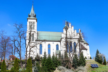 MSZANA DOLNA, POLAND - APRIL 07, 2019: The Michael Archangel church - obrazy, fototapety, plakaty