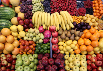 Various fresh summer exotic fruits for sale on market