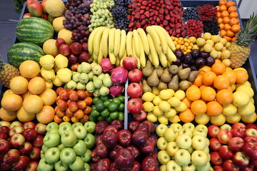 Various fresh summer exotic fruits for sale on market