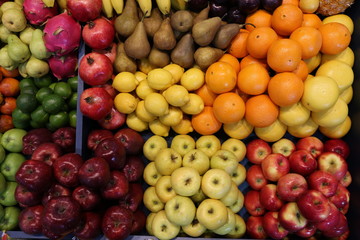 Various fresh summer exotic fruits for sale on market
