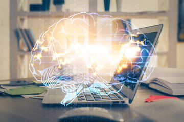 Multi exposure of work table with computer and brain hologram. Brainstorm concept.