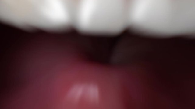 Zoom effect. Man with angry facial expression is screaming out loud. Portrait of a shouting man with mouth wide open. Furious yelling man. Anger emotions. Anger. Violence. White teeth.
