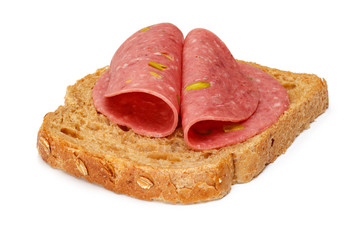 Salami slices and bread slice isolated