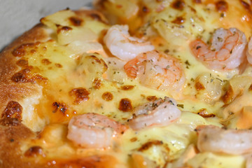 italian pizza cheese with pineapple and shrimp topping sea food