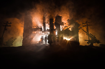 War Concept. Military silhouettes fighting scene on war fog sky background, World War Soldiers Silhouette Below Cloudy Skyline At night.