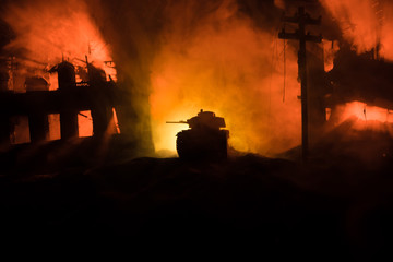 War Concept. Military silhouettes fighting scene on war fog sky background, World War Soldiers Silhouette Below Cloudy Skyline At night.