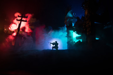 War Concept. Military silhouettes fighting scene on war fog sky background, World War Soldiers...