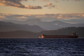 Large boat waiting at  a maritime coast empty to get loaded in Canada 