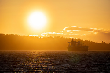 Large cargo transportation boat waiting empty near island ground coast pacific north west china corona virus canada 