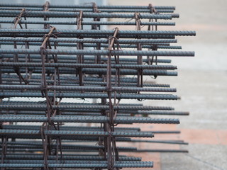 Round steel stacks are tied with Spirals steels sheath to make the concrete column for building construction