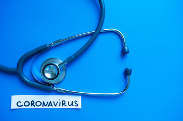 Medical stethoscope on a blue background. Classic blue.