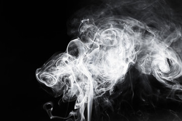 White smoke on a black background