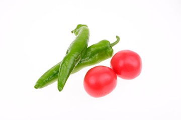 Peppers and tomatoes, on a white background