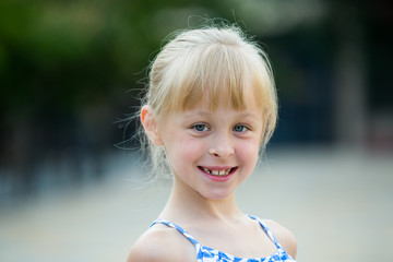 Portrait of happy girl outdoors