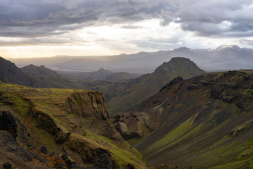 Green canyon and Mountain during dramatic and colorful sunset on the Fimmvorduhals Hiking trail near Thorsmork