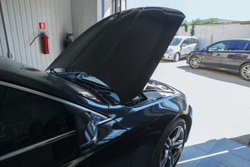 car under repair in car service