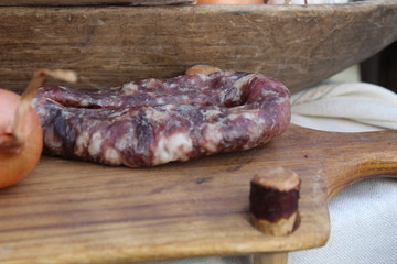 dried dried homemade sausage on a Board