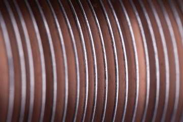 Close-up flat copper twisted plates at the factory
