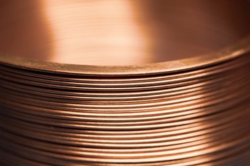 Close-up flat twisted copper wire at a factory