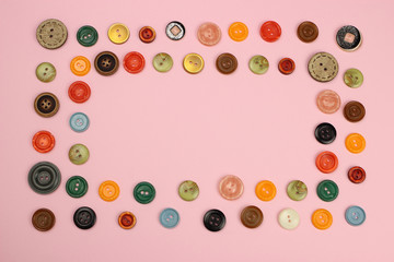 Frame of various sewing buttons with space for text