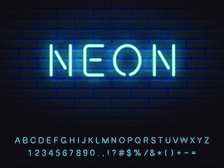 Set of bold light blue neon font. Letters, numerals, signs, icons with transparent glow for web design and advertising