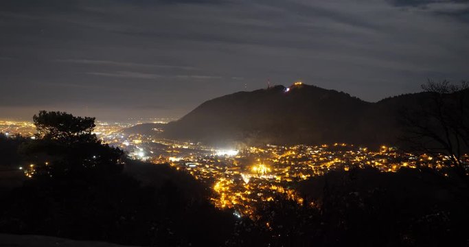 Top view night panorama of city lights in Brasov, Romania