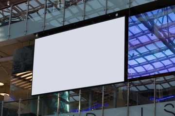Blank advertising panel in the interior of the shopping center