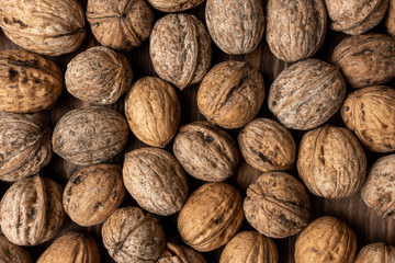 walnut is sprinkled on the table. background. texture. place for text