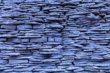 The brown and grey  cobblestone or brick tower, fortress or castle wall background or texture © Майджи Владимир