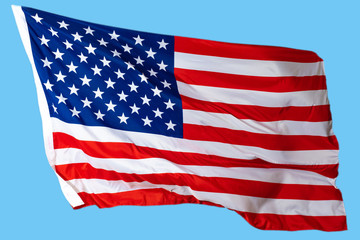Official symbols of the American state. Symbol of statehood of the United States. A waving American flag on a blue background. The star-spangled banner.