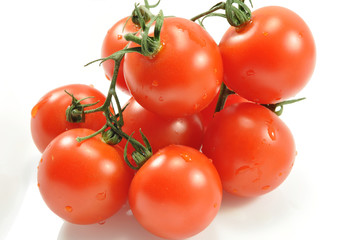 Beautiful tomatoes on a white background