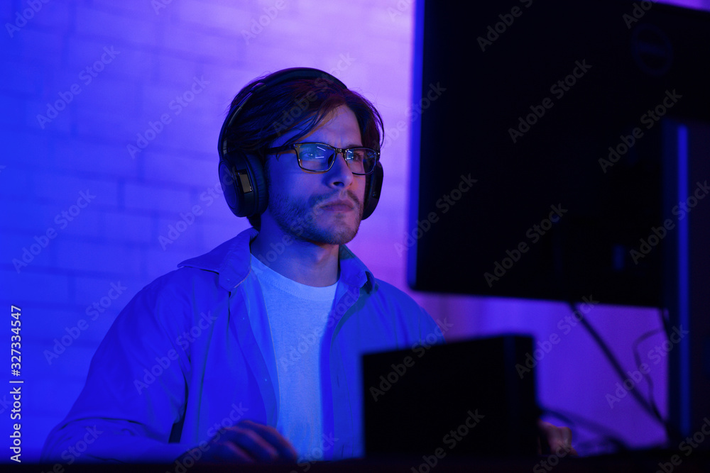Aufkleber Man Working On Computer Programming Website Sitting Indoor At Night