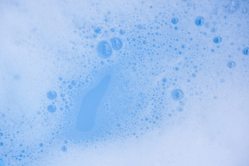 Abstract background white soapy foam texture. Shampoo foam with bubbles