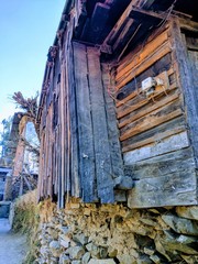 Dilapidated wooden house in a village