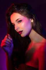 Colorful portrait of a pretty young sensual woman