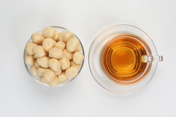 Ampalang snack fish ball a favourite Sabah Borneo food with cup of transparent licker tea 