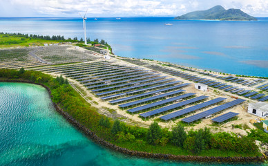 Aerial view on artificial island with solar batteries