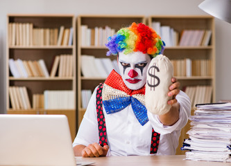 Clown businessman working in the office