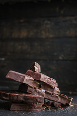 chocolate (delicious cocoa dessert, pieces sweets) menu concept. food background. top view. copy space 